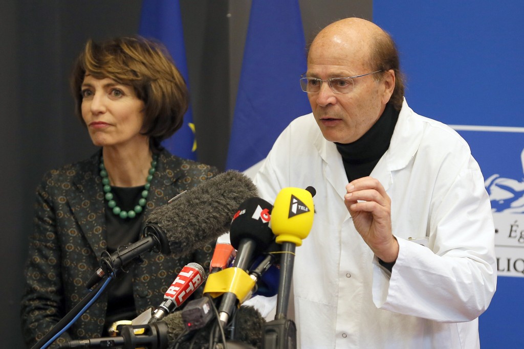 French Health Minister Marisol Touraine, left, and Professor Gilles Edan, the chief neuroscientist at Rennes Hospital, address the media during a press conference held in Rennes, western France, Friday, Jan. 15, 2016. Six previously healthy medical volunteers have been hospitalized  including one man who is now brain dead  after taking part in a botched drug test at the Biotrial lab in western France, the French Health Ministry said Friday. (AP Photo/David Vincent)