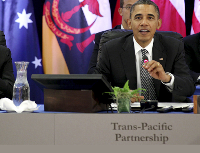 U.S. President Barack Obama (R) speaks as Brunei's Sultan and Prime Minister Hassanal Bolkiah (L) listens during the Trans-Pacific Partnership Leaders meeting at the Hale Koa Hotel during the APEC Summit in Honolulu, Hawaii, November 12, 2011. REUTERS/Larry Downing (UNITED STATES - Tags: POLITICS BUSINESS) - RTR2TXQO