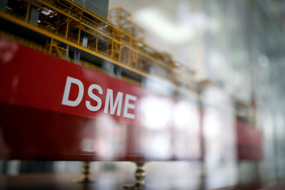 The name of Daewoo Shipbuilding & Marine Engineering Co is seen on a replica ship displayed at its building in Seoul, South Korea, March 24, 2017. REUTERS/Kim Hong-Ji
