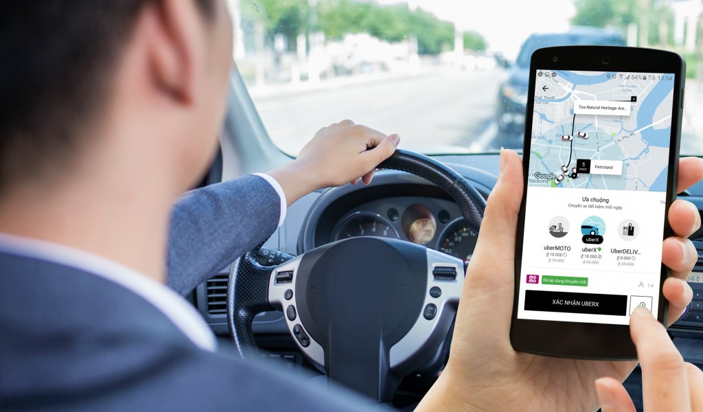 hiện nay, có thể sử dụng ví điện tử MoMo để trả tiền các dịch vụ Uber tại Việt Nam
